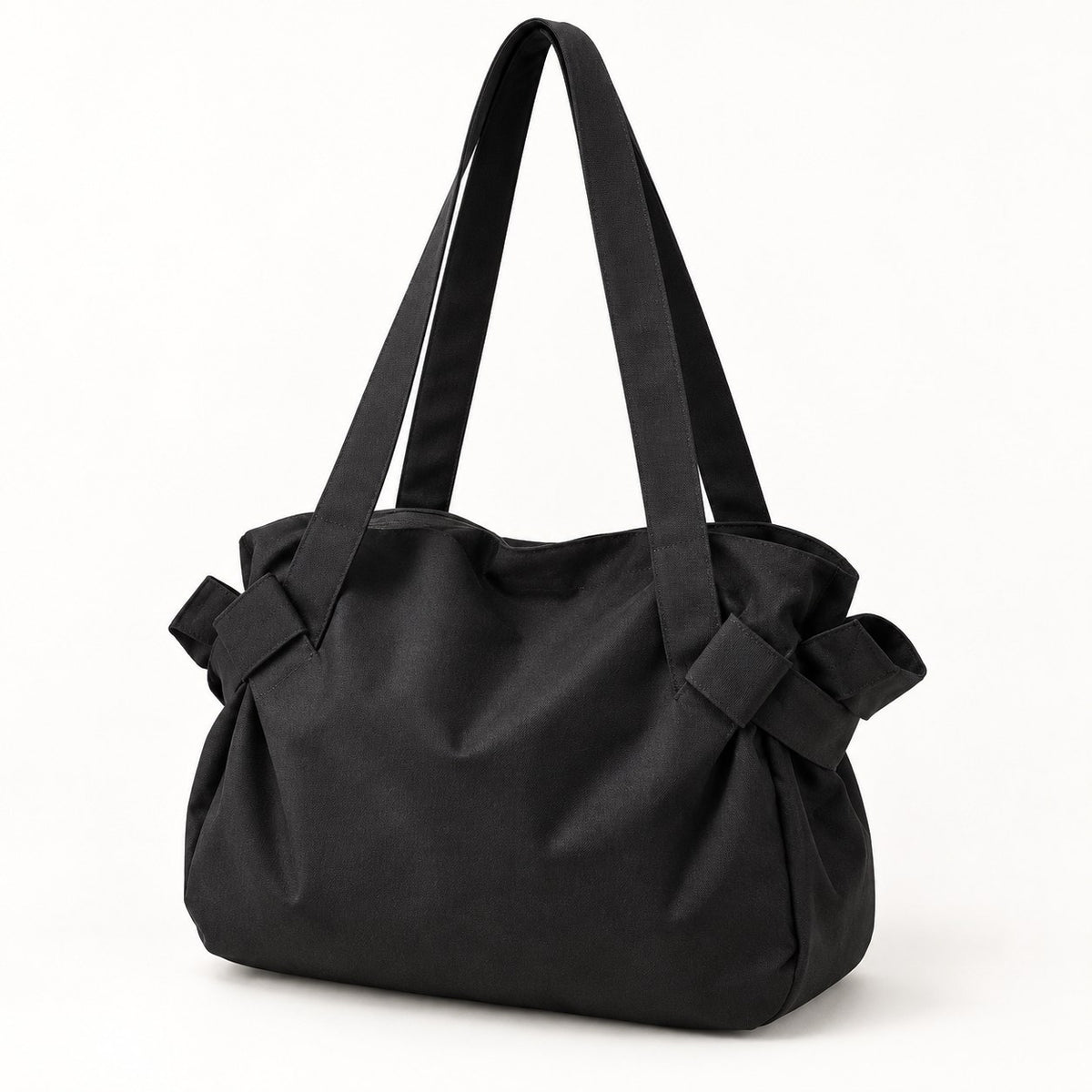 Black convertible picnic tote bag on a clean studio background