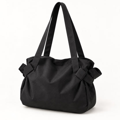 Black convertible picnic tote bag on a clean studio background
